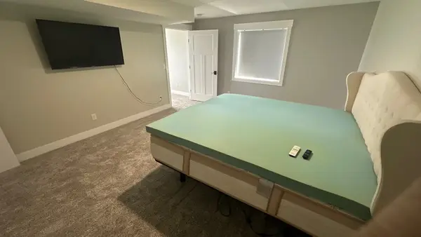 Finished bedroom with new carpet