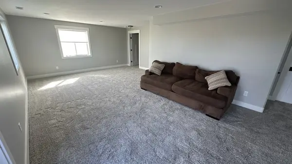 Finished living area with new carpet